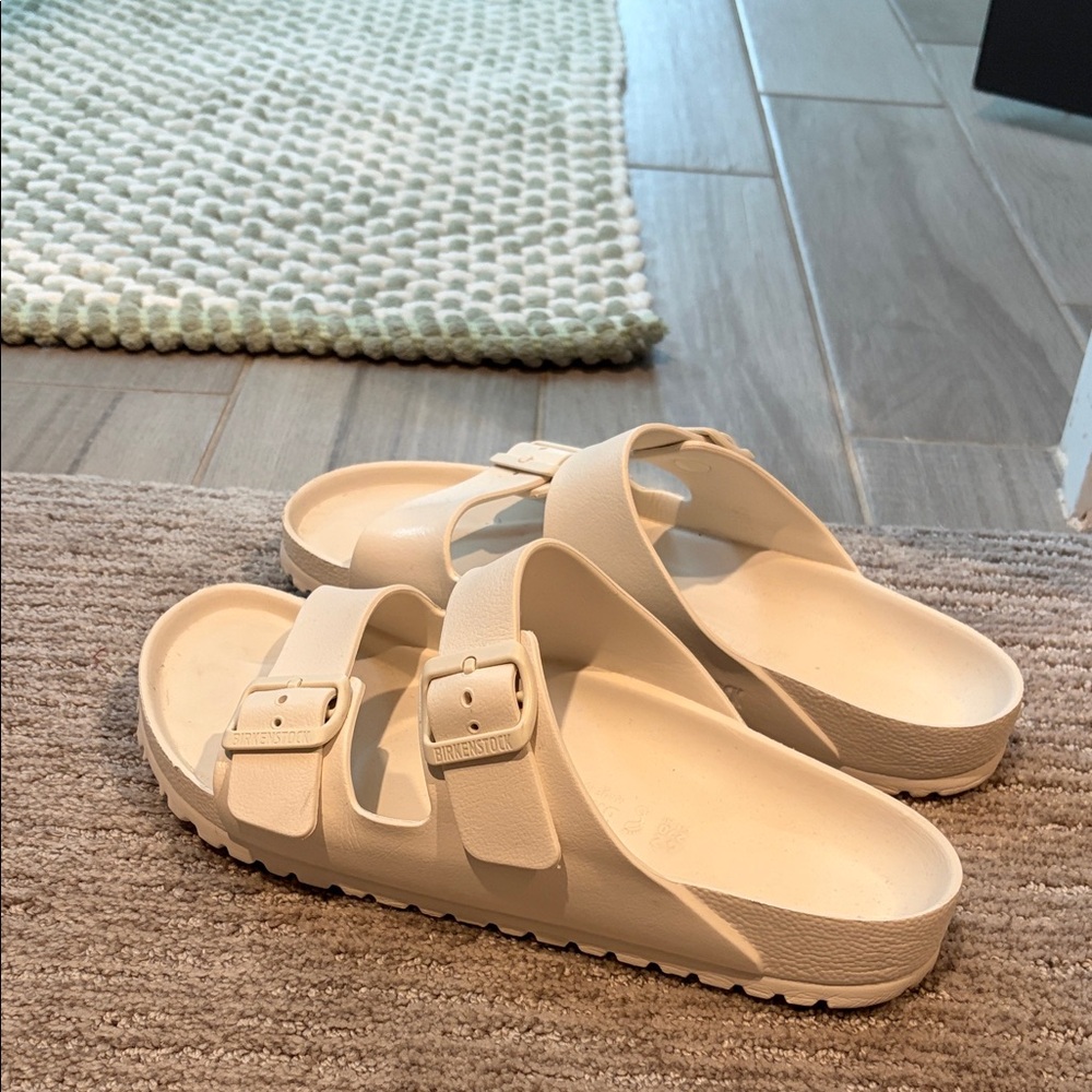 BIRKENSTOCKS size 42 white, lightly worn, excellent